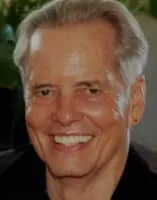 Mark W. Travis - Director