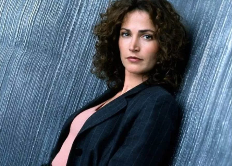 Kim Delaney - American actress