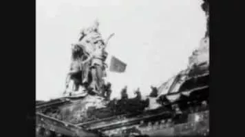 Raising a Flag over the Reichstag - Photograph by Yevgeny Khaldei
