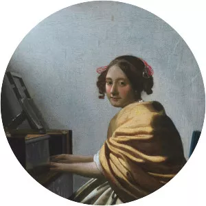 A Young Woman Seated at the Virginals