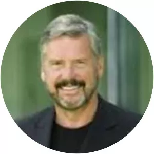 Brian L. Halla - Executive