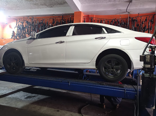 Henry y V, Centro de Alineacion y balanceo - ATV repair shop in Santo Domingo, Dominican Republic