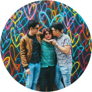 karma wears white ties - Musical artist