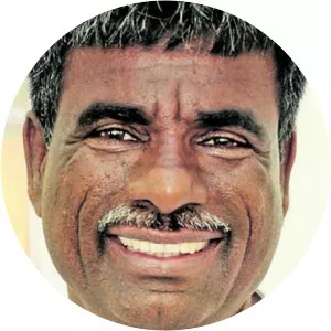 Kota Srinivas Poojary - Minister of Fisheries, Ports and Inland Transport of Karnataka