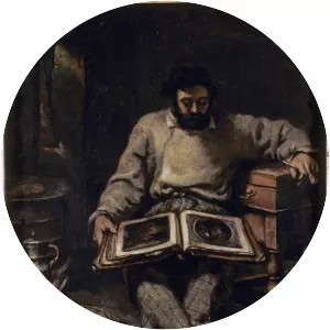 Marc Trapadoux is Examining the Book of Prints