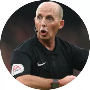 Mike Dean - English former association football referee