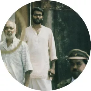 Nizhalkkuthu - 2002 ‧ Drama/Crime ‧ 1h 32m