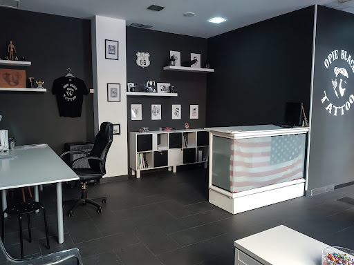 Opie Black Tattoo - Tattoo shop in Naron, Spain