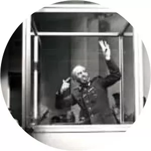 The Man in the Glass Booth photograph