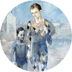 Two acrobats with a dog